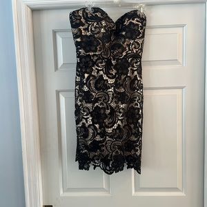 My hoco dress from senior year,strapless, black lace with gold silk under dress